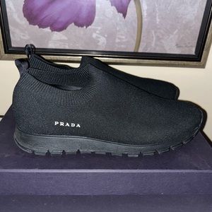 Mint condition (worn about 3 times) Wms Prada sneakers. Originally $620 Sz 7.5